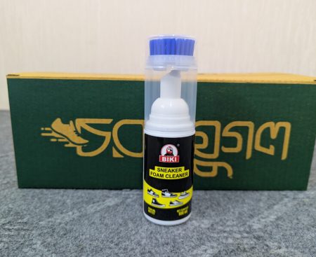 Sneakers cleaner with a built-in brush